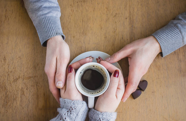 Cup of coffee for Breakfast in the hands of lovers. - Photo, Image