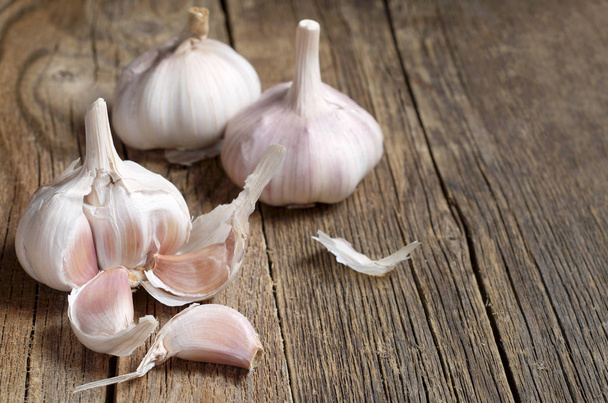 Garlic on table  - Фото, зображення