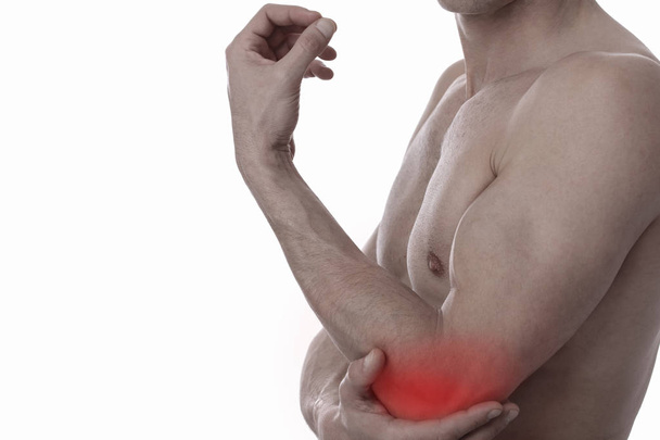 Man With Pain In Elbow. Pain relief concept. Sports exercising injury. - Foto, imagen