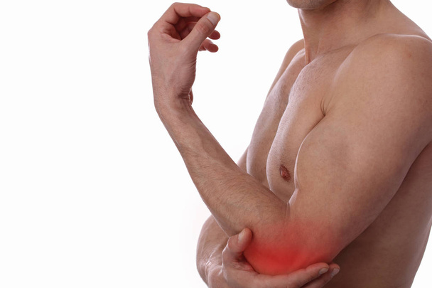 Man With Pain In Elbow. Pain relief concept. Sports exercising injury. - Foto, Imagem