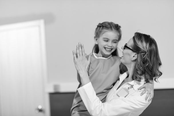 Doctor with little patient  - Photo, Image