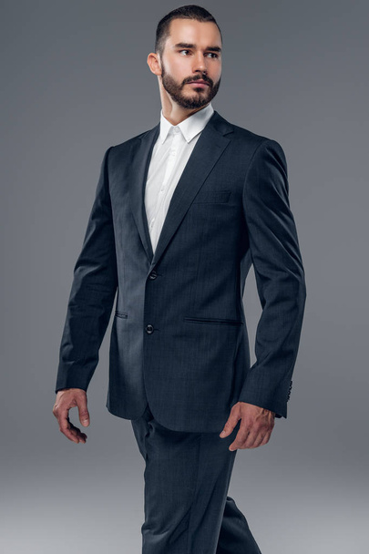 Stylish bearded male in a business suit - Zdjęcie, obraz