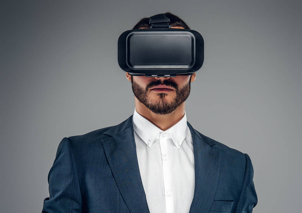 Bearded man with virtual reality glasses - 写真・画像