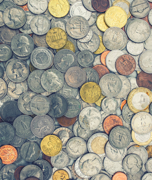 Coins of several currencies - background pattern. - Fotografie, Obrázek