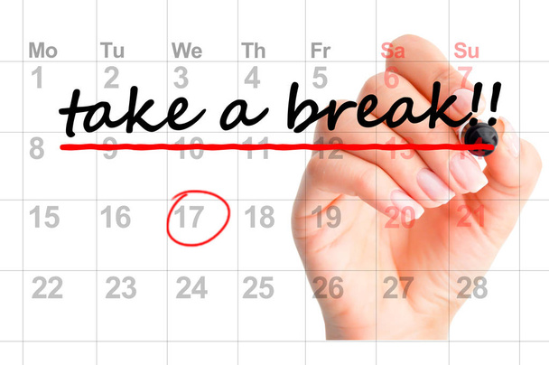 Tome un descanso señalado marcado en el calendario o agenda personal
 - Foto, Imagen