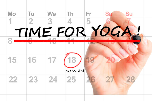 Close-up van Time for yoga tekst op kalender - Foto, afbeelding