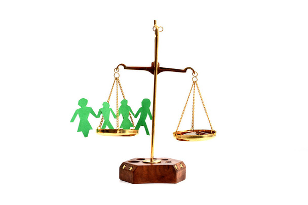 Balance your life concept with scale weighting money and family life isolate on white background - Photo, Image