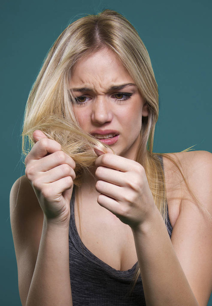 dry and damaged hair problem - Фото, изображение