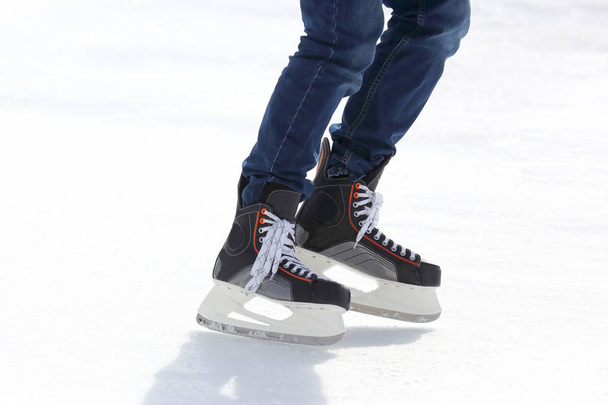 feet skating on the ice rink - Photo, Image