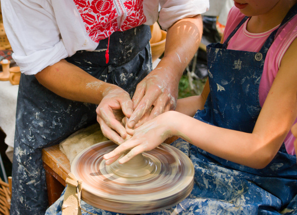 Potter teaches to the handicraft - Photo, Image