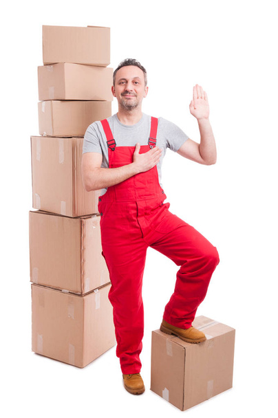 Full body of mover man in overall making swear gesture - Foto, immagini