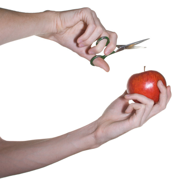 Apple and scissors in male hands - Photo, Image