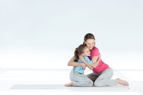 Mother and daughter exercising - Foto, immagini