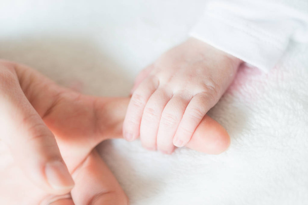 Vauva käsi yksityiskohta
 - Valokuva, kuva