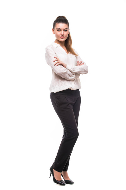 Pleine longueur jeune femme droite posant en studio isolé sur fond blanc
 - Photo, image