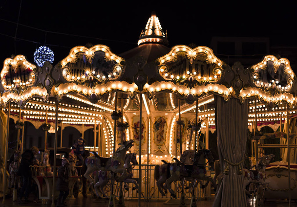 Dreamy magical night lights of a carousel - Photo, Image
