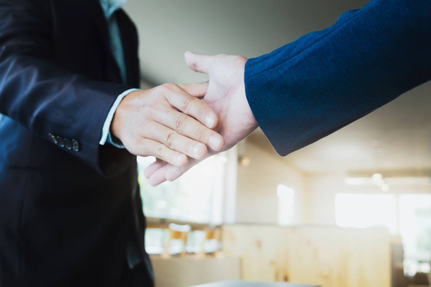 Businessmen handshake; success, dealing, greeting & business par - Photo, Image