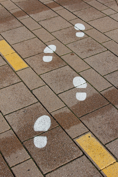 geschilderde voetafdrukken - Foto, afbeelding