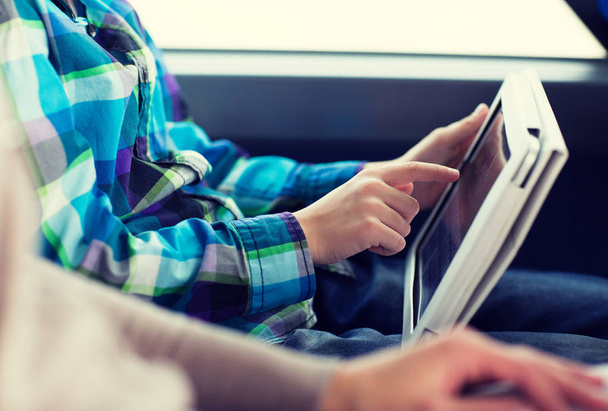 close up of boy with tablet pc in travel bus - Fotoğraf, Görsel