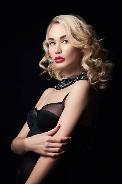Sexy beautiful blonde girl with long hair. Perfect woman portrait on black background. Gorgeous hair and nice eyes. Natural beauty, clean skin, facial care and hair. Strong and thick hair. Jewelry - Φωτογραφία, εικόνα