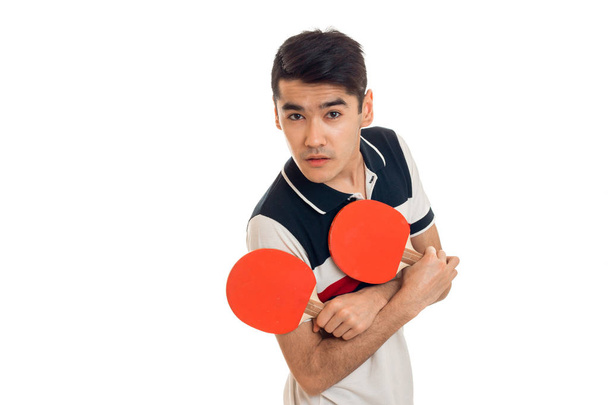 portrait of young sportsman practicing table tennis in uniform isolated on white background - Φωτογραφία, εικόνα