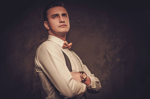 Sharp dressed man wearing suspenders  - Zdjęcie, obraz