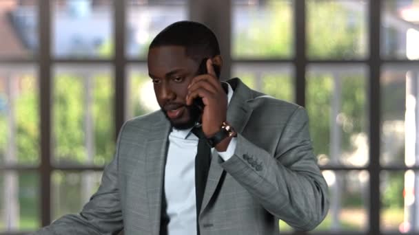 Black businessman phone talking. - Video