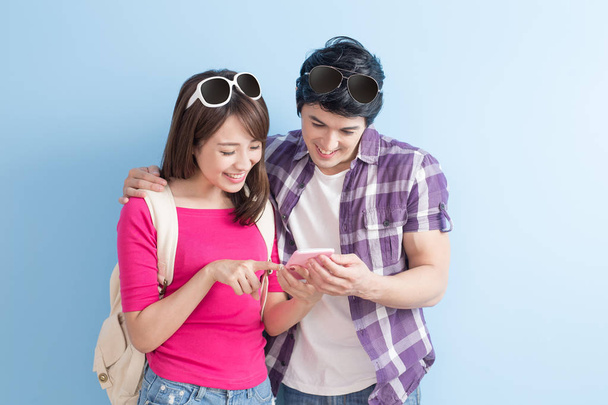 young couple using  phones   - Foto, Imagen