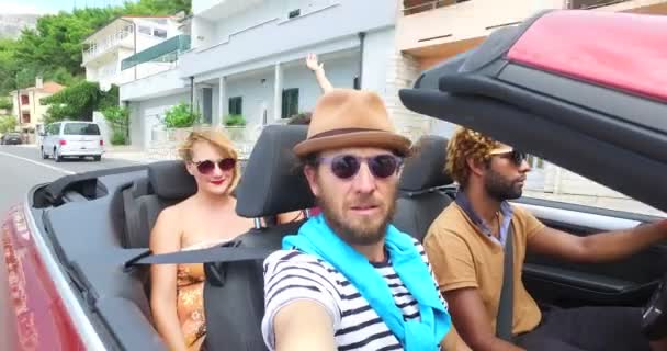 people having fun riding in convertible - Footage, Video