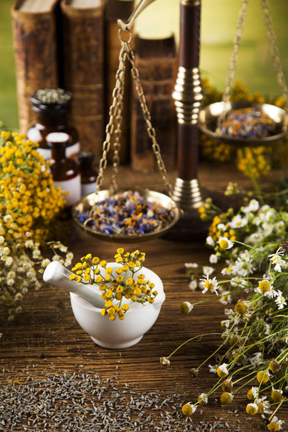Herbal medicine on wooden desk - Fotó, kép