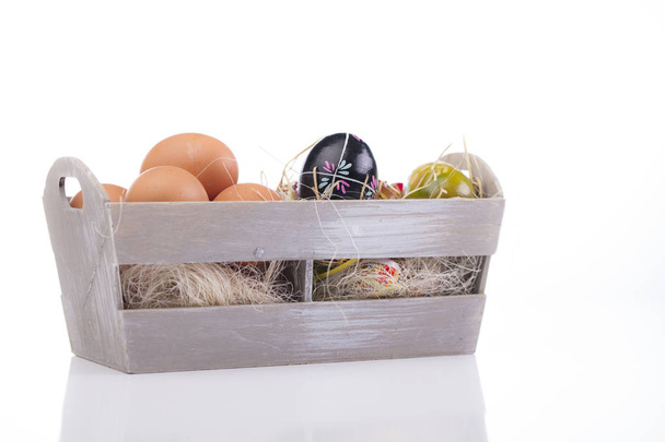 Eggs in a basket - Φωτογραφία, εικόνα