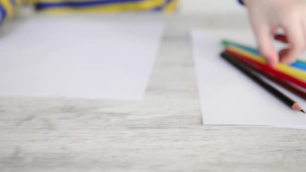 child drawing with yellow pencil  - Felvétel, videó