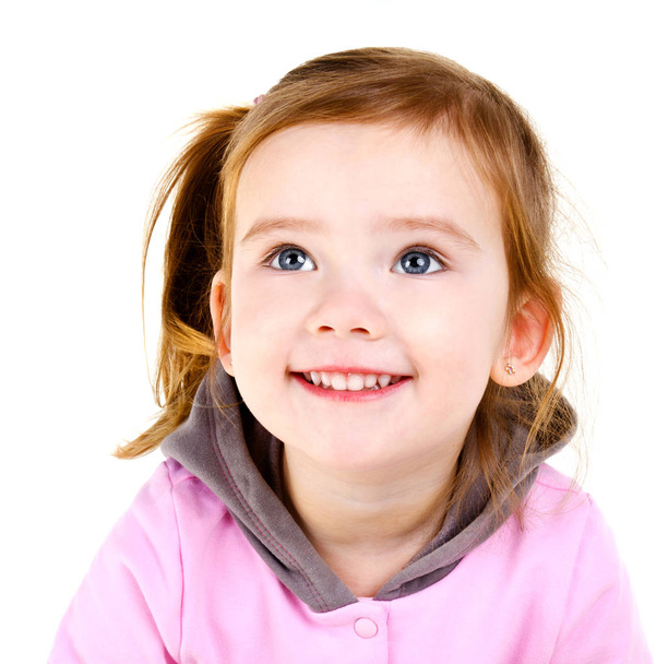 Portrait of  smiling cute little girl isolated  - Fotó, kép