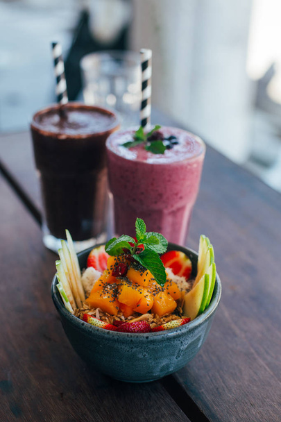 berry smoothie and coffee and fruit salad - Valokuva, kuva