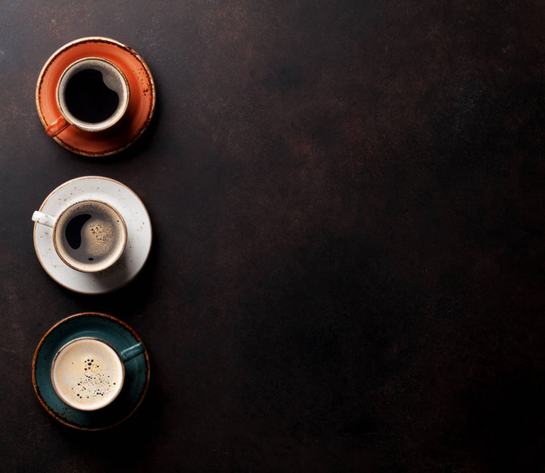 Coffee cups on old kitchen table - 写真・画像