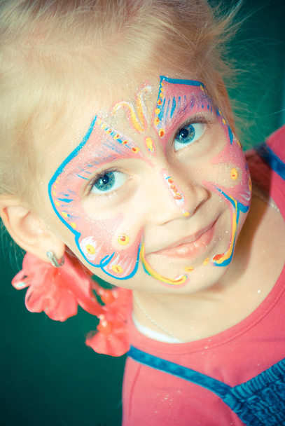 Pretty Girl Child with face painting. Make up. - Foto, Bild