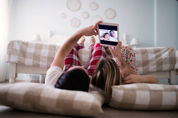 Couple in love using tablet - Photo, Image