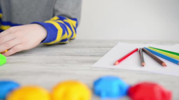 child playing with colorful puzzles - Video