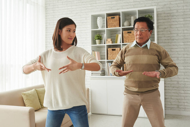 woman and her father doing breathing exercises - Photo, Image