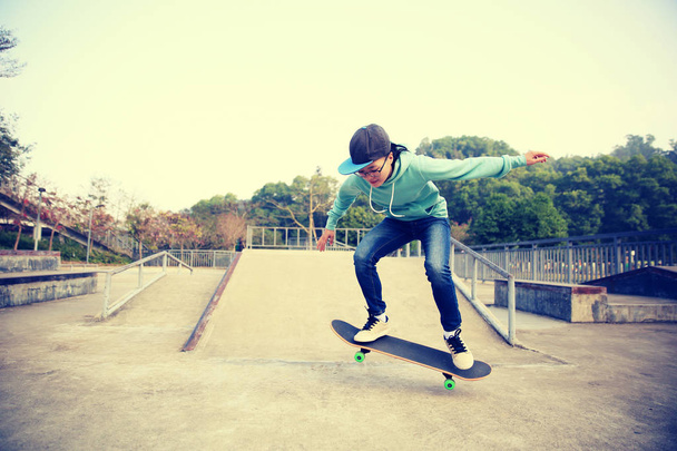 young skateboarder practicing - Fotó, kép