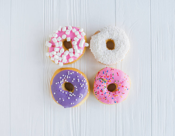 Different colorful sweet donuts - 写真・画像