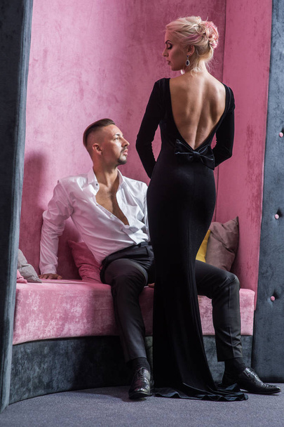 Young beautiful couple in a suit and evening gown - Photo, Image