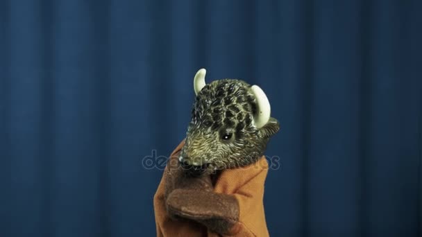Bull hand puppet nodding head, pointing and shake arm with blue background - Footage, Video