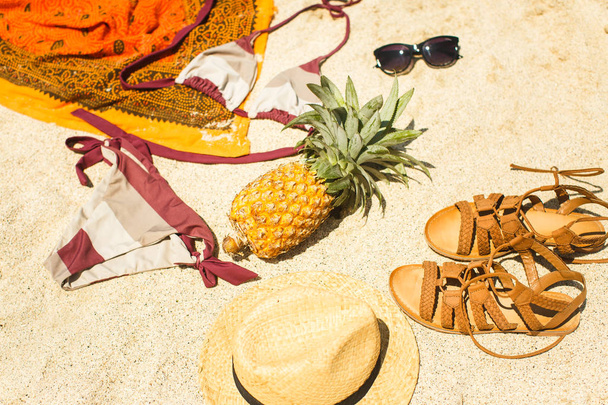 beach image: sandals, bikini, hat and glasses - Photo, image