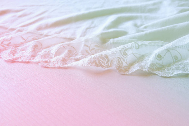 Background of white delicate lace fabric - Foto, afbeelding