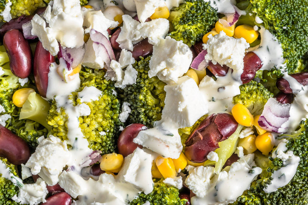 Broccoli salad with vegetables and feta cheese. - Φωτογραφία, εικόνα