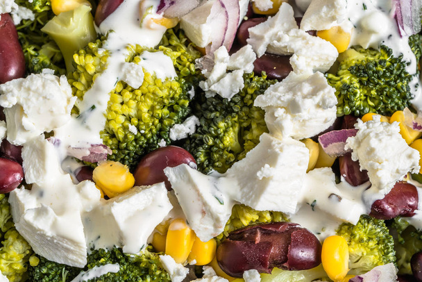 Broccoli salad with vegetables and feta cheese. - Fotografie, Obrázek