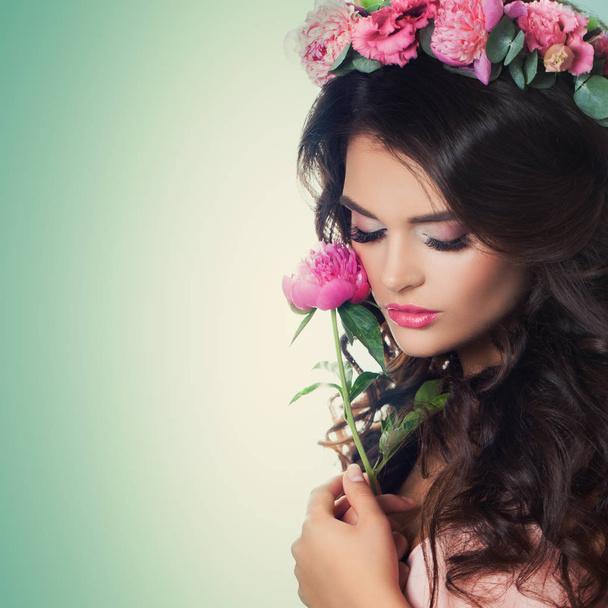 Beautiful Woman with Peony Flower on Green Background. Relaxing  - Fotó, kép