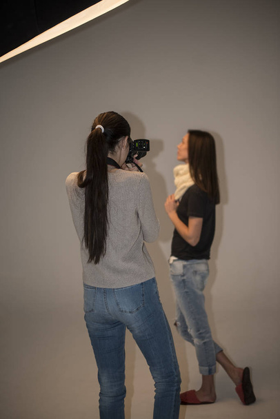Photographer woman working with model  - Φωτογραφία, εικόνα
