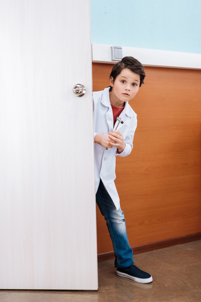 Boy doctor in uniform - Фото, изображение
